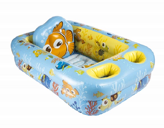 Inflatable baby bathtub for bathing a paralyzed dog.
