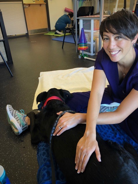 Dr. Jenny Moe with a canine patient